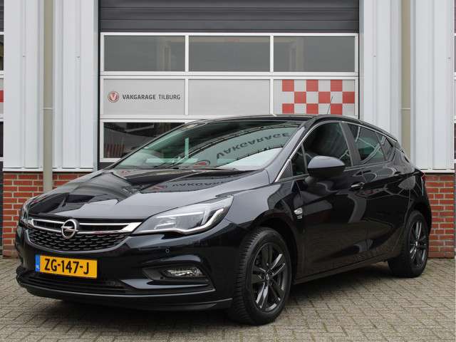 Opel Astra 1.4 turbo 120jaar edition 150pk automaat /navi/pdc/climate/cruise control/dab+/led/apple carplay/android auto/donker glas/nap! 1e eig! foto 5